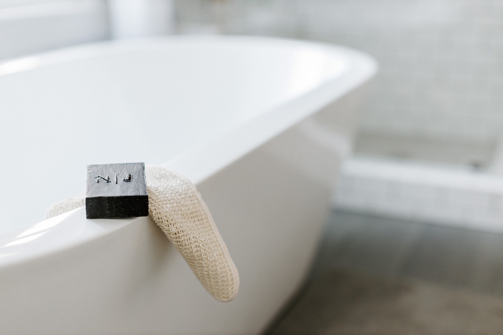 brand photography of bathtub and bar of soap