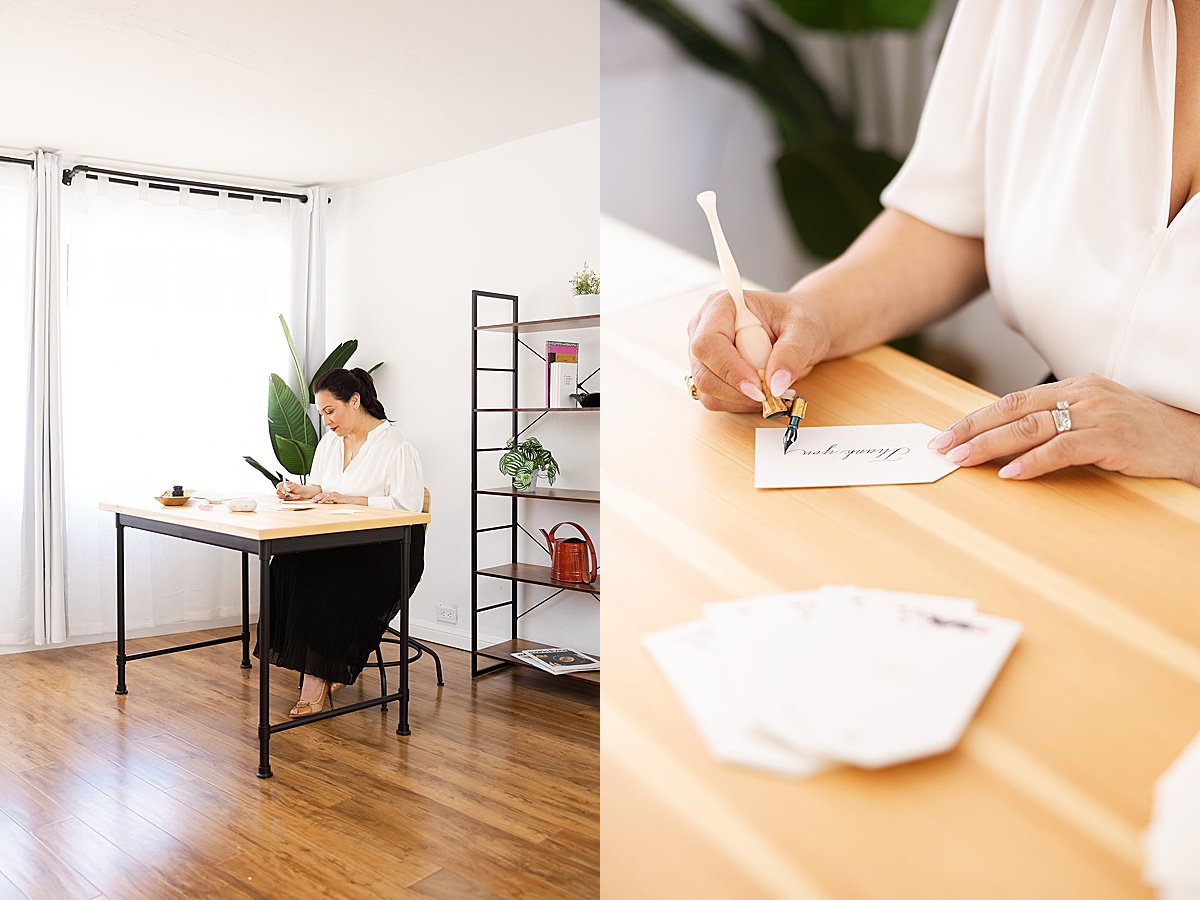 women at desk writing during her photoshoot with a San Francisco Branding Photographer