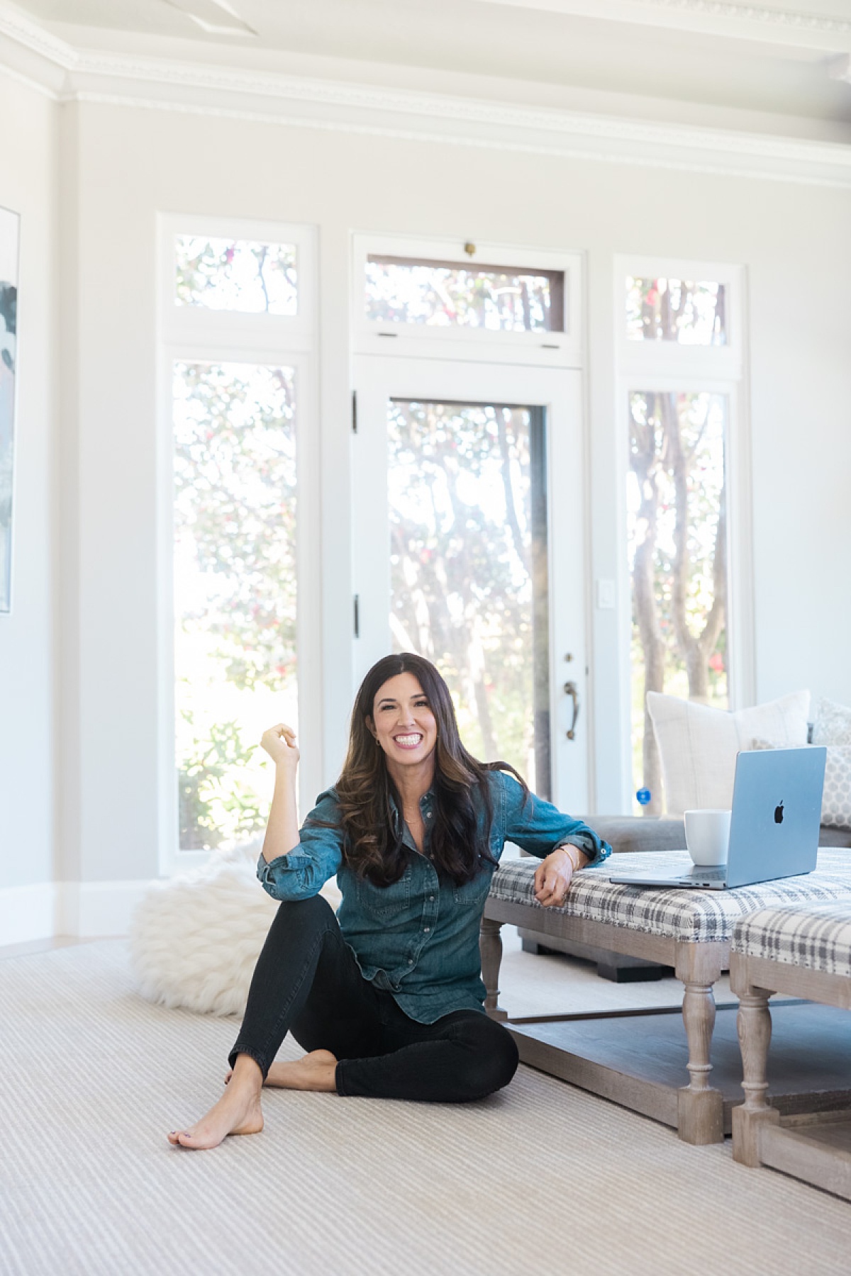 Women sitting in her bedroom by computer captured by San Francisco Brand Photographer