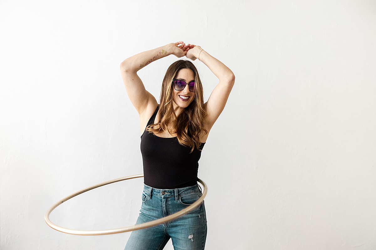 women dancing with a hoop as her props during her shoot with Amy Thompson Photography 