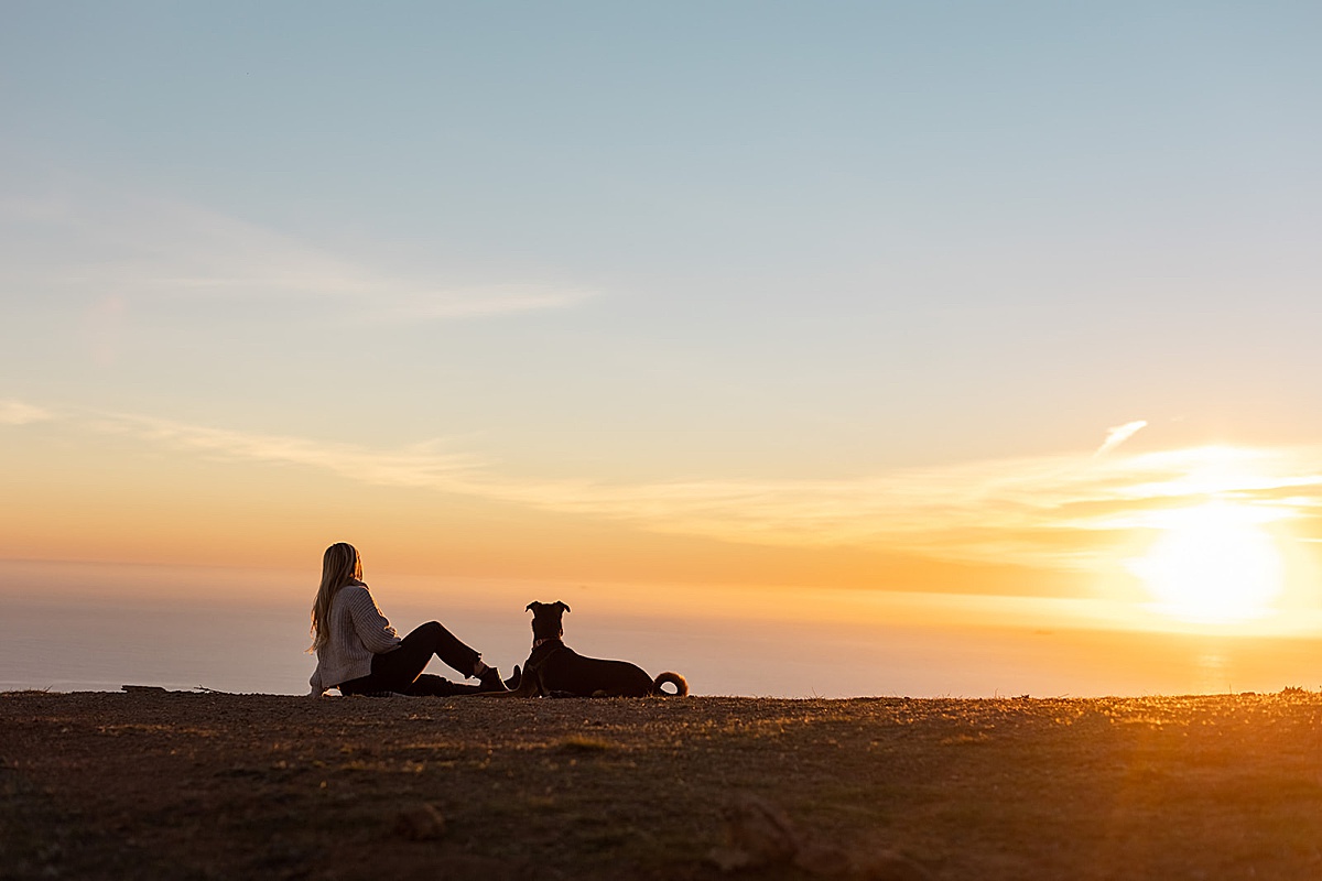 women and dog sitting watching the sunset captured by San Francisco Brand Photographer