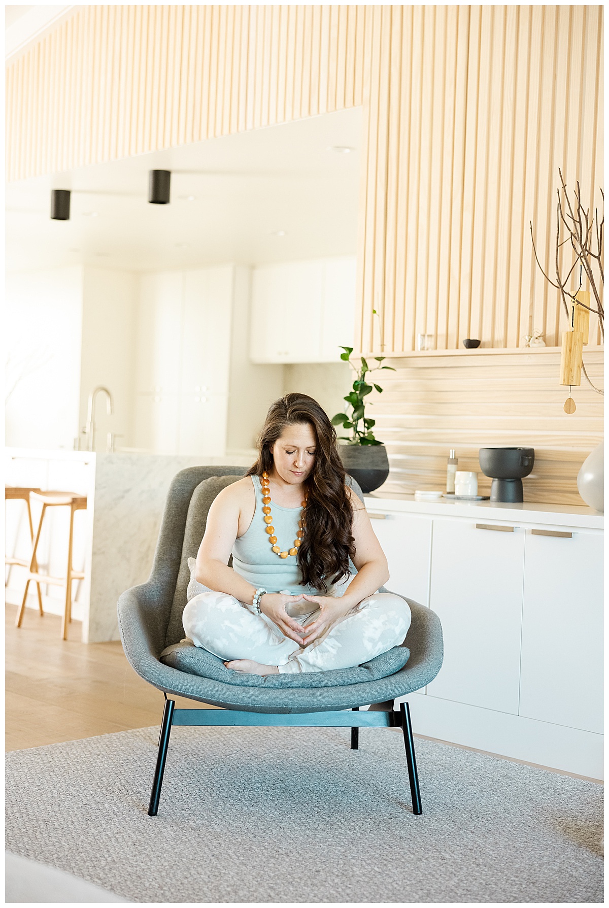 Woman sits in a chair for San Francisco Brand Photographer