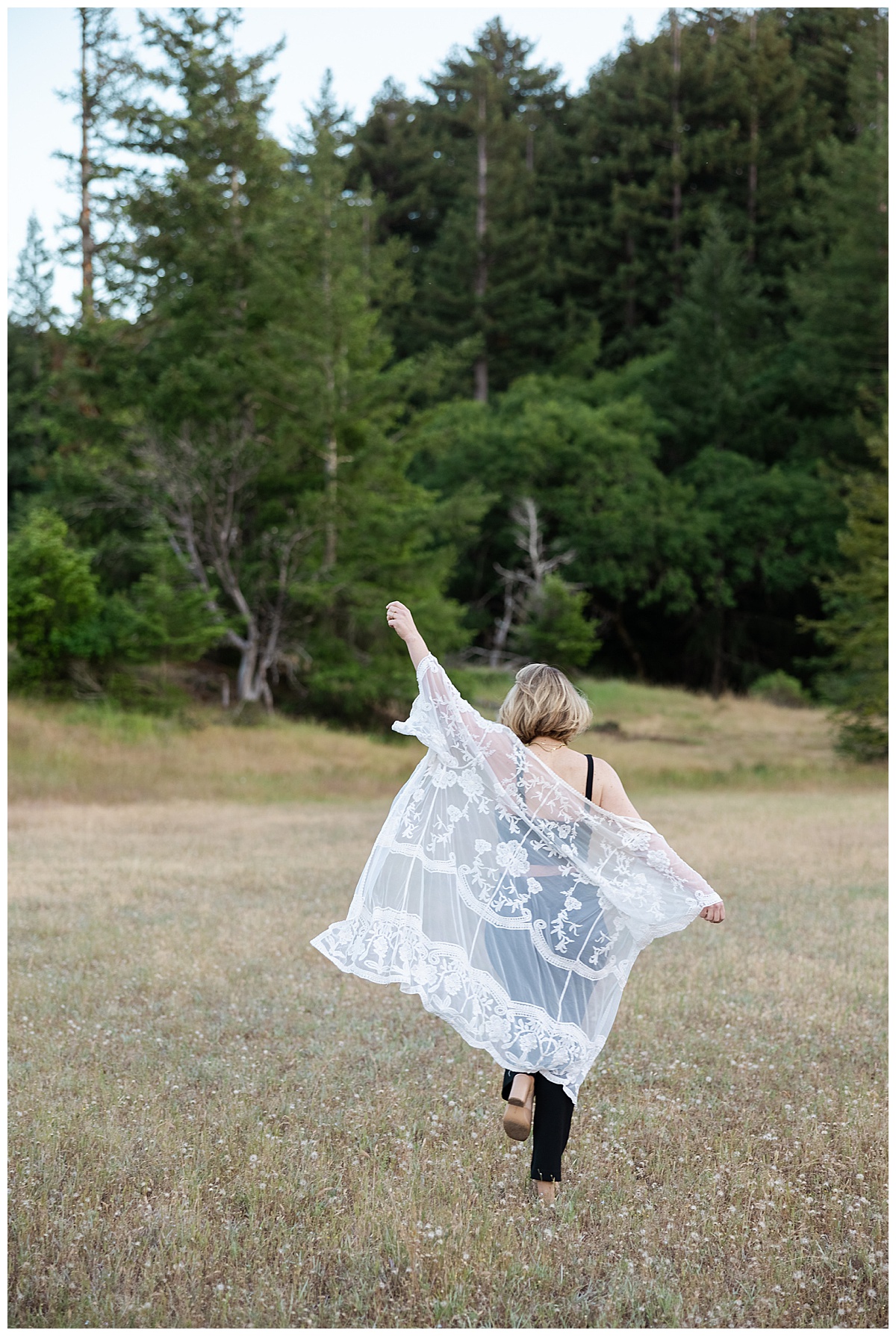 Person waves her hands in the air for San Francisco Brand Photographer